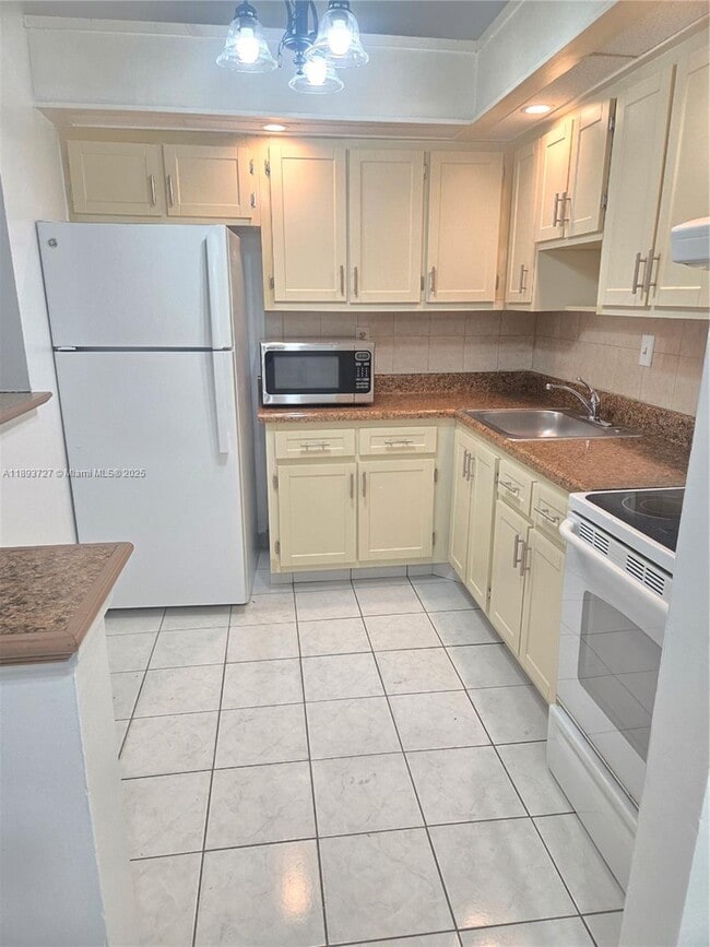 Photo - 18875 NW 62nd Ave Unit 202