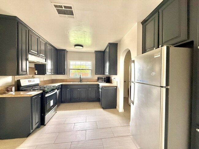 Photo - Spacious Three-Bedroom Two-Bathroom Home with large yard $3,095