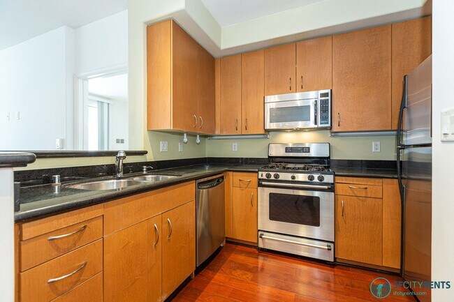 Photo - Downtown/Civic Center: Condo near Hayes Valley w/ Private Patio, Google Fiber & Garage Parking Unit 851 Van Ness Ave. #202