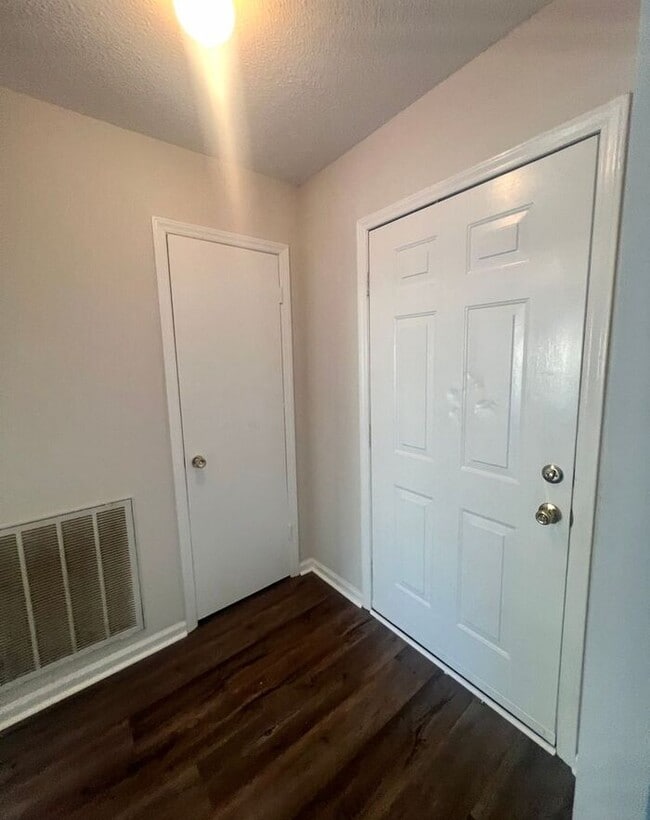 Photo - Brick one level home, Live Oak Tree, 3-4 bedrooms, fenced yard, deck.