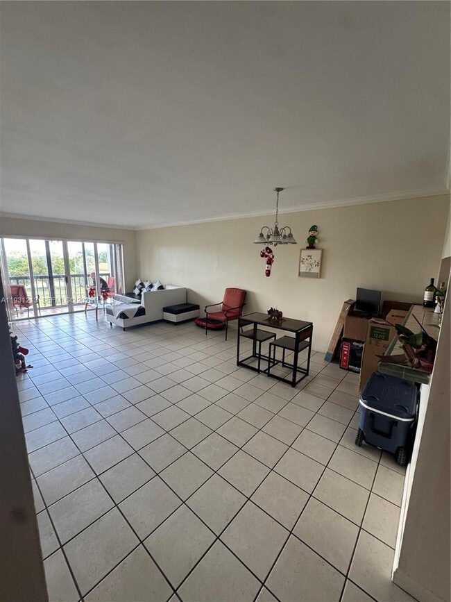 Building Photo - 10155 NW 9th St Cir Unit 4-401