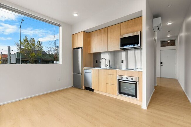 Building Photo - 7480 N Delaware Ave Unit 104