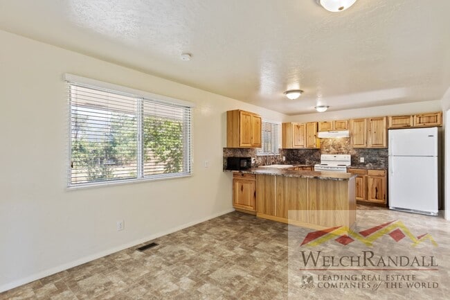 Photo - Elegant Layton Home Offering Space, Style, and Scenic Views!