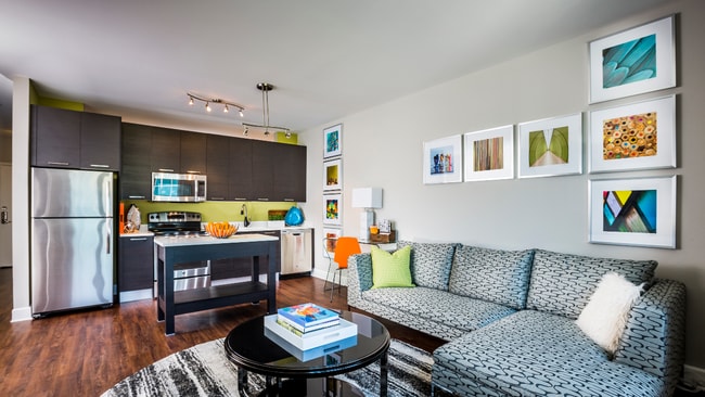 Sustainable wood plank-style flooring throughout