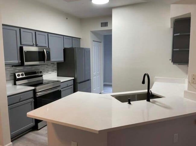 Building Photo - 9825 Baywinds Blvd Unit 2102