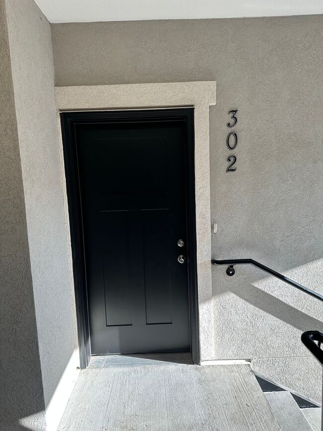 Photo - Bright and Modern 3 Bed Condo in Prime Location with Pool & Clubhouse!!