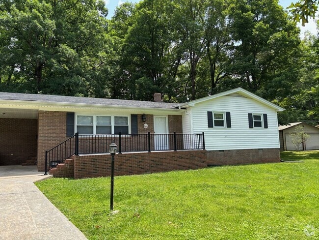 Building Photo - Nice brick home, single carport, storage b...