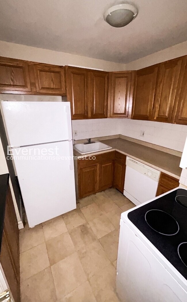 Photo - Charming Condo with Shared Amenities and Playground | Pet Friendly | Available Soon! Unit 4