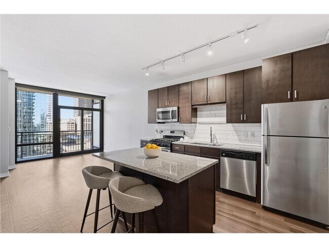 Building Photo - 497 S Marquette Ave Unit 1410