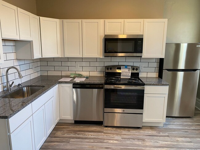 Photo - Gorgeous 1 and 2 bedroom apartments for re... Unit Fl 2