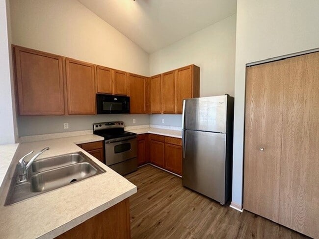 Photo - VERY NICE AND NEUTRAL, SECOND FLOOR CONDO, 2BEDROOMS & 2 FULL BATHS. ONE CAR GARAGE