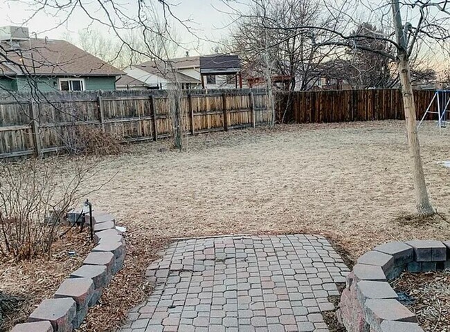 Photo - 4BR Tri-Level with Sunroom & Oversized Fenced Yard & 2-Car Garage!