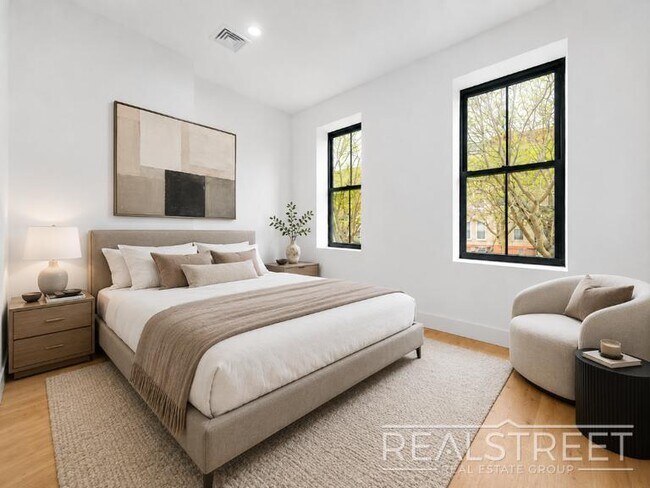 Photo - Brand New flex 3 Bed 2 Bath with Private Yard and W/D! Unit 1