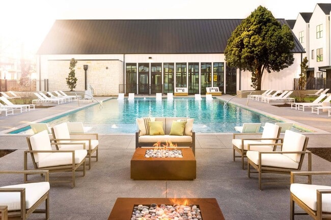 Gather with friends around the outdoor fire pit, creating warm memories on cool nights.
