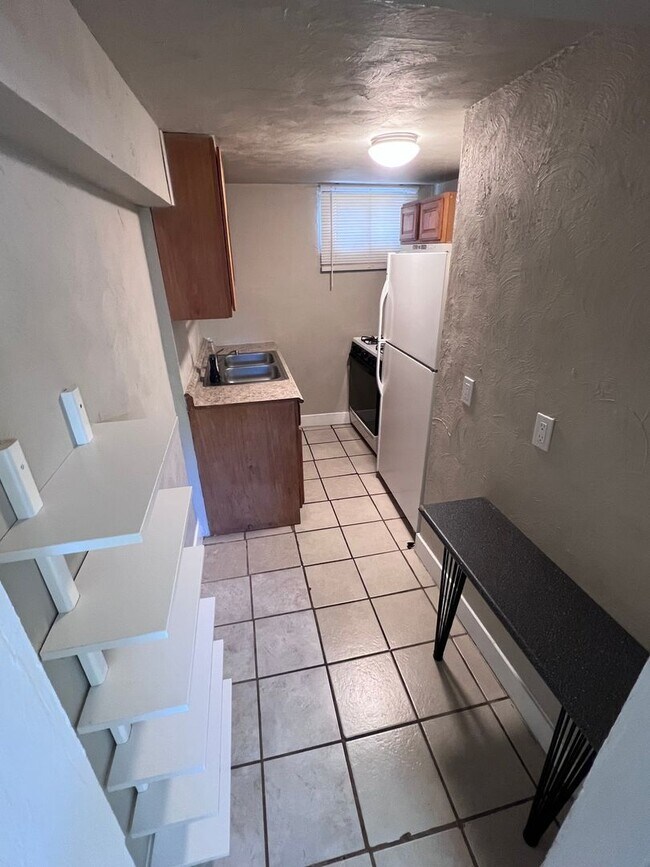 Photo - Lower Level of Charming 1BR Townhome in De...
