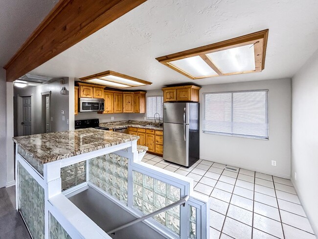 Photo - Spacious 5-Bedroom Home with Lofted Garage