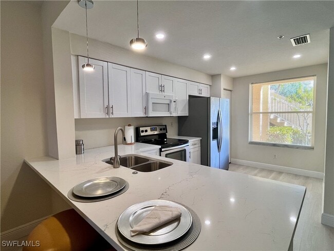 Building Photo - 6920 Huntington Lakes Cir Unit 103