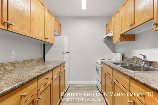 Photo - Main Floor Unit, Assigned Parking, Onsite Laundry, BONUS INCENTIVE