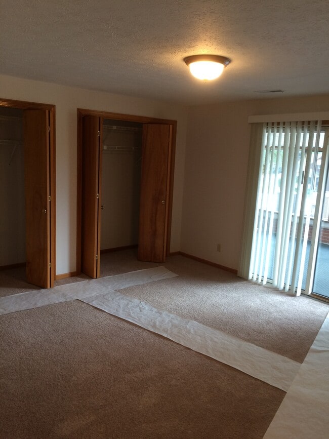 Dormitorio principal - 7065 Starcliff Ave NW Unidad 3