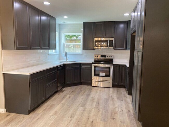 Photo - Complete Remodel - New Kitchen, Baths, Win...