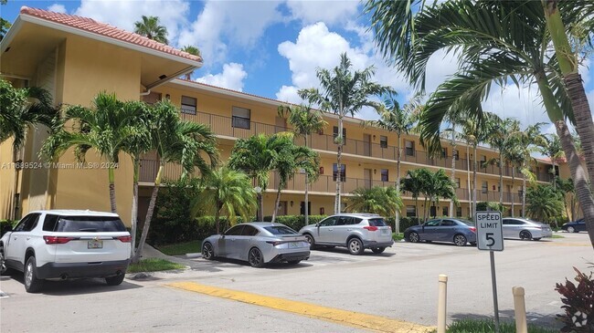 Building Photo - 11477 NW 39th Ct Unit 202-1 Rental