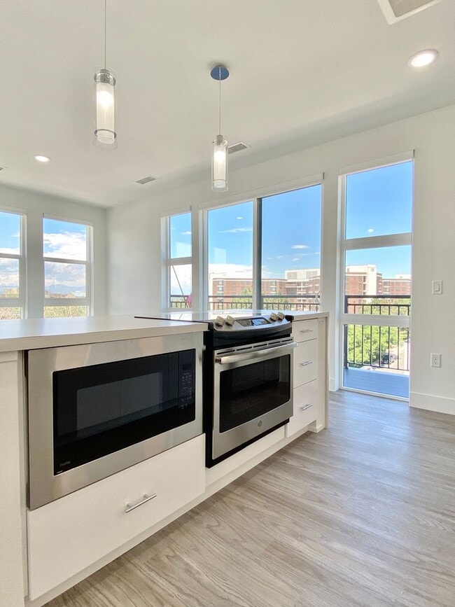 Photo - Luxury Top-Floor Condo with Stunning Mountain & City Views Unit 504