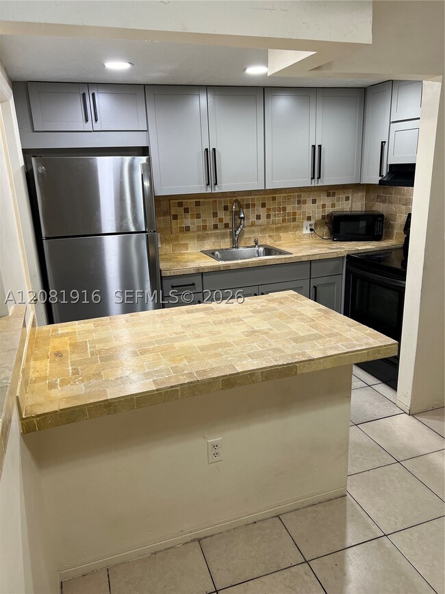 Building Photo - 1515 NE 125th Terrace Unit 407