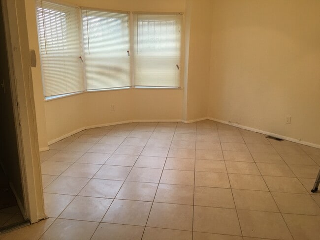 Living room. - 686 S 11th St Unit First Floor