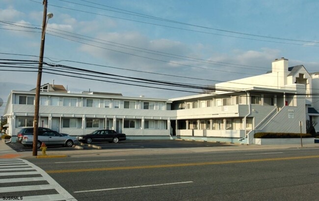 Building Photo - 9105 Atlantic Ave Unit 41