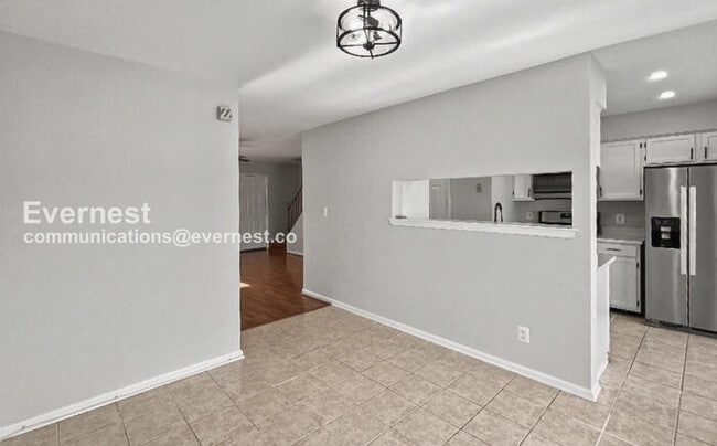 Photo - 3 Bed/1.5 Bath Townhome with Fenced Yard / Pet-Friendly / Vouchers Accepted / Available Now!