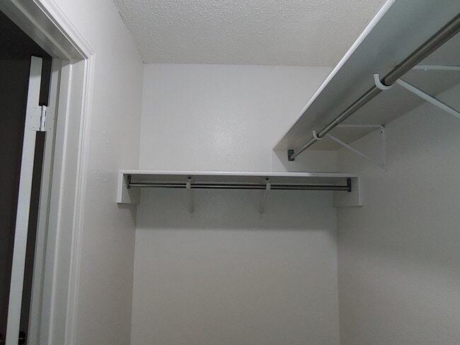 Master bedroom closet. - 6466 Beech Trail Dr