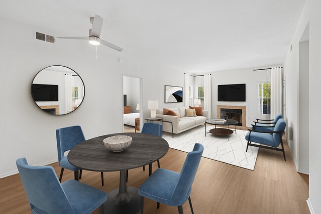Renovated Package I dining and living room with hard surface flooring