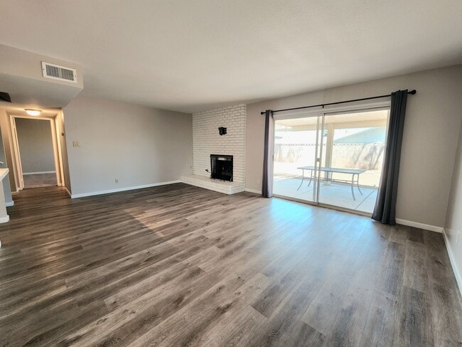 Photo - 4 Bedroom Two-Story Home with Downstairs Primary Bedroom & Fireplace