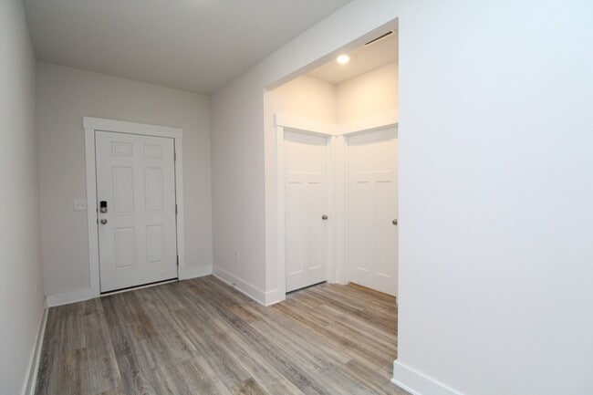 Photo - Don’t Miss This 4BR Home — 3-Car Garage, Modern Interior, Open Layout & Community Pool in Prime 9...