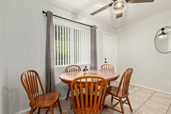 Dining room with backyard door - 115 W 10th St Unit 10th and Ash condo 115