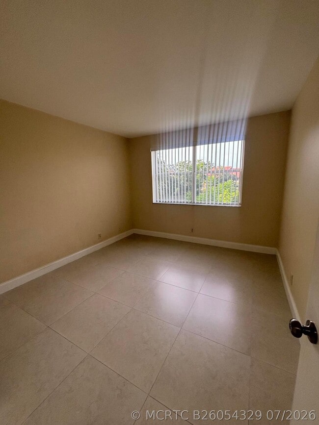 Photo - 8761 Wiles Rd Unit 304
