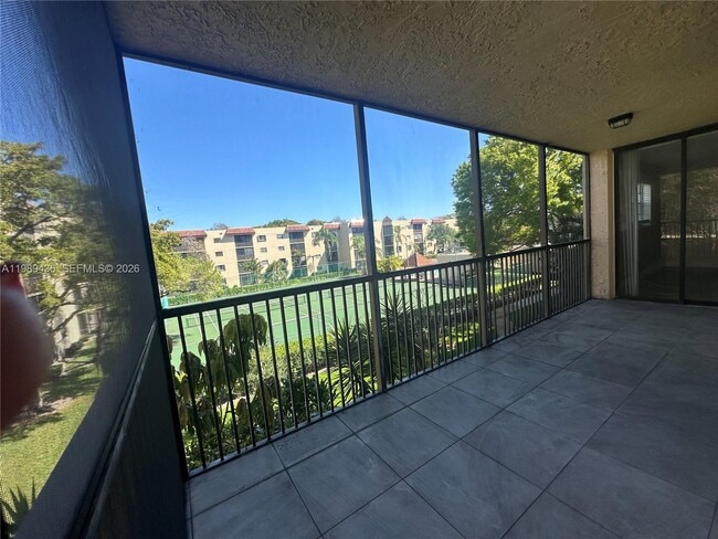 Building Photo - 10401 W Broward Blvd Unit 301