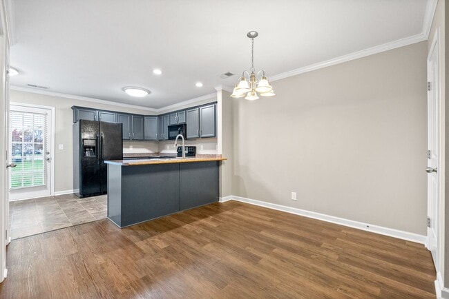 Building Photo - Just Reduced! Updated Townhome near Tennov...