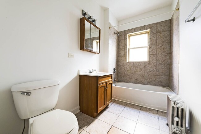 Photo - 7109-15 S Ridgeland Ave 1736-44 E 71st Pl Chicago, IL 60649