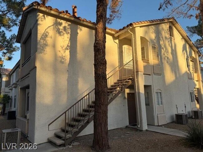 Building Photo - Modern Gated Condo with Stylish Upgrades & Private Balcony!