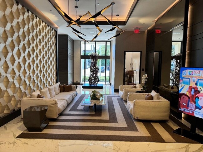 Building Photo - 301 Altara Ave Unit 425