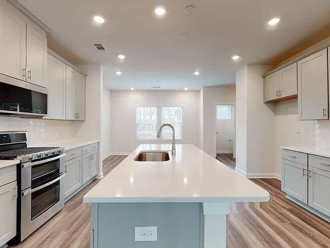 Building Photo - spacious and beautifully appointed townhome