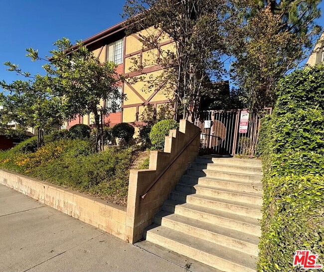 Building Photo - 10220 De Soto Ave Unit 11