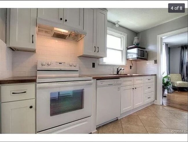 Photo - Beautiful Rancher with Large Fenced In Back Yard and Nice Sized Deck. Schedule Your Tour Now!