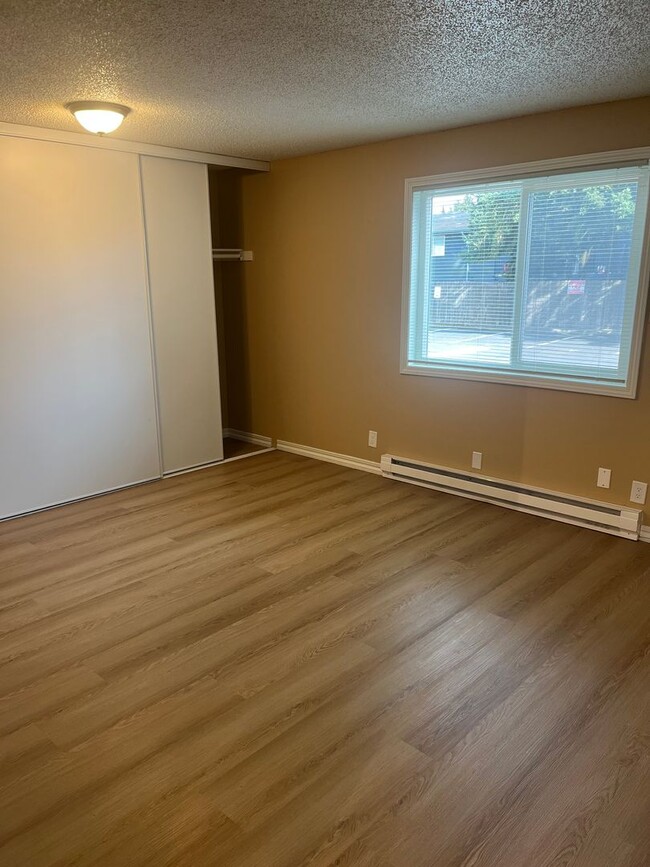 Photo - 1 Bed • 1 Bath Downstairs Unit - Updated Flooring Unit 3434-57