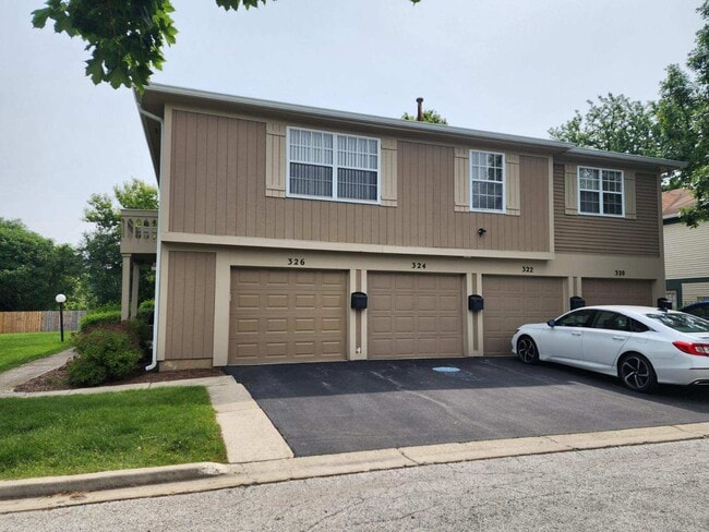 Front (second entire floor) with driveway parking - 326 Plumwood Ln Townhome