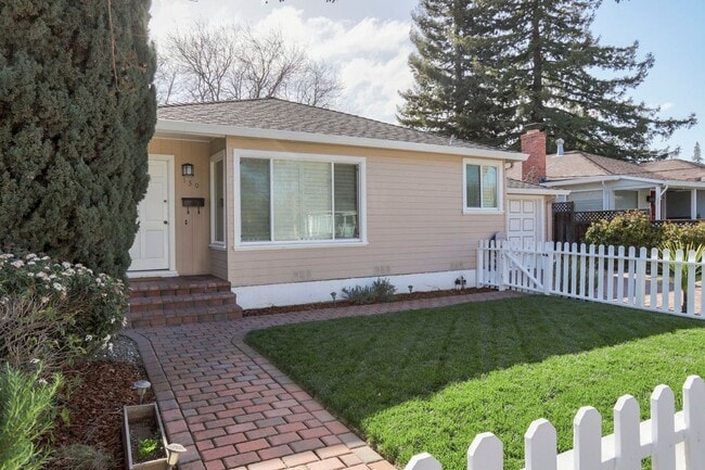 Photo - 3 Bed / 2 Bath Redwood City home with calming backyard oasis and a white picket fence. YouTube to...