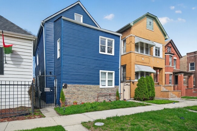 Building Photo - 8428 S Escanaba Ave Unit 1