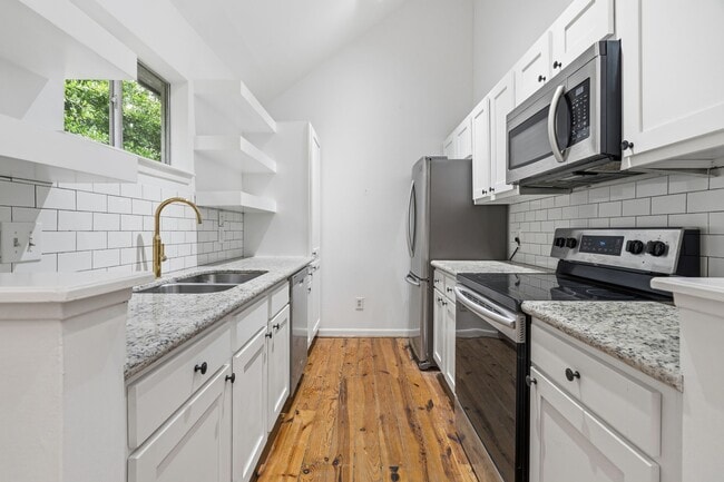 Building Photo - 1616 Kipling St Unit C