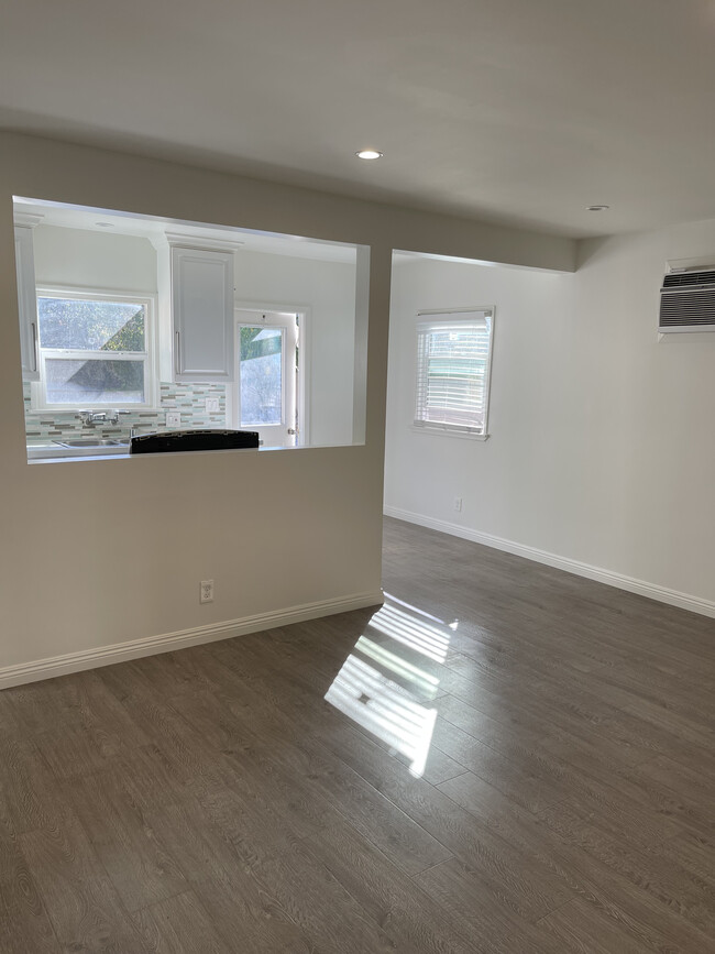 Spacious living area with breakfast/dining area - 2823 Hermosa Ave Unit 2823